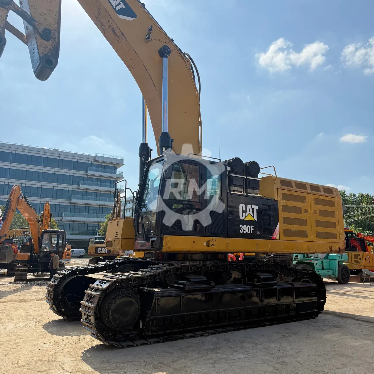 Cab-side view of the CAT 390F L excavator with its body exterior and tracks visible.