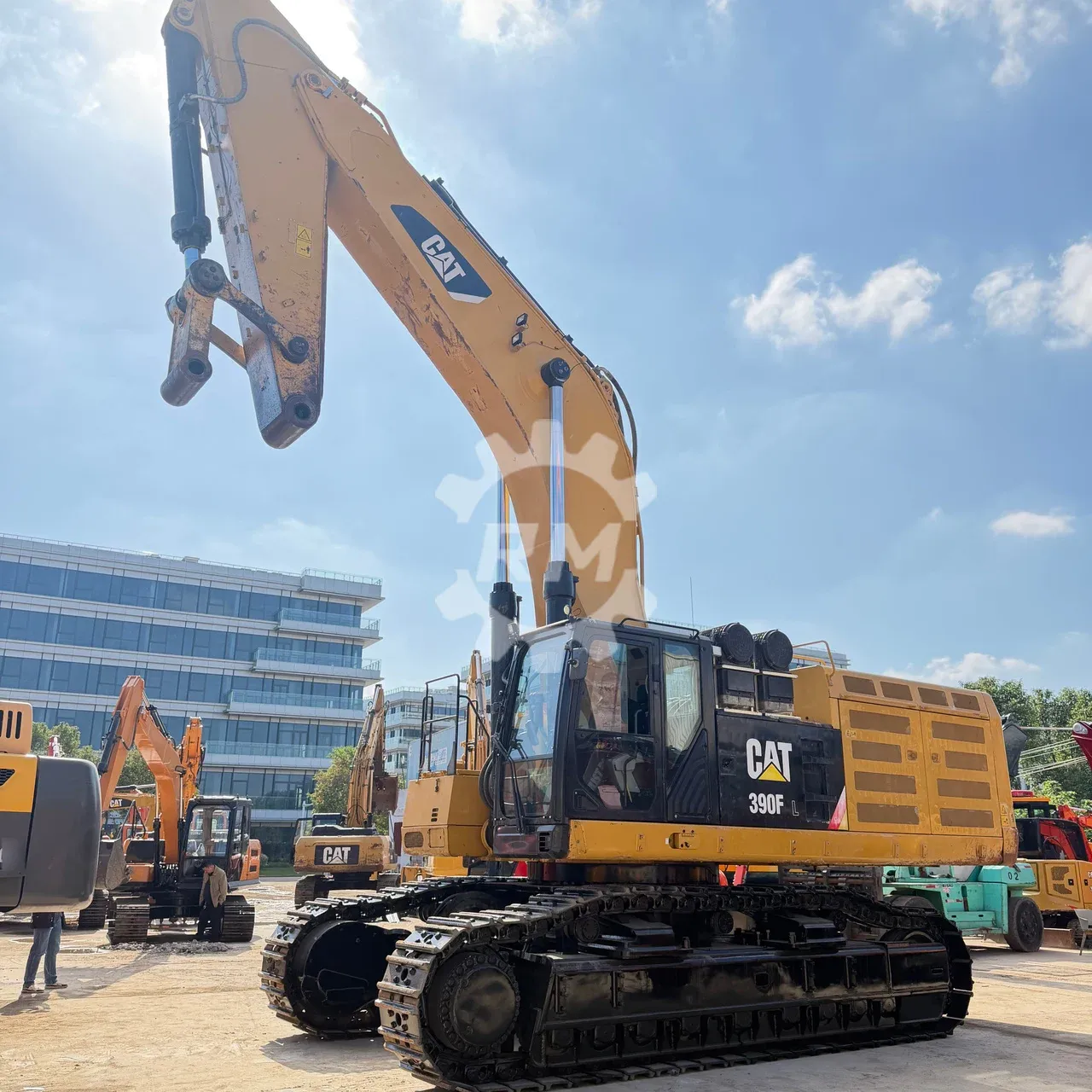 Another yard angle of the CAT 390F L excavator showing its front linkage, body and undercarriage.