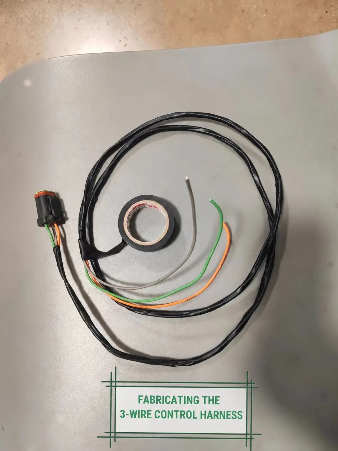 Prepared control harness with three visible wire ends and an electrical connector.